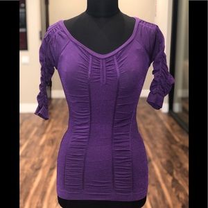 Bebe stretch top with sleeves. Brand new